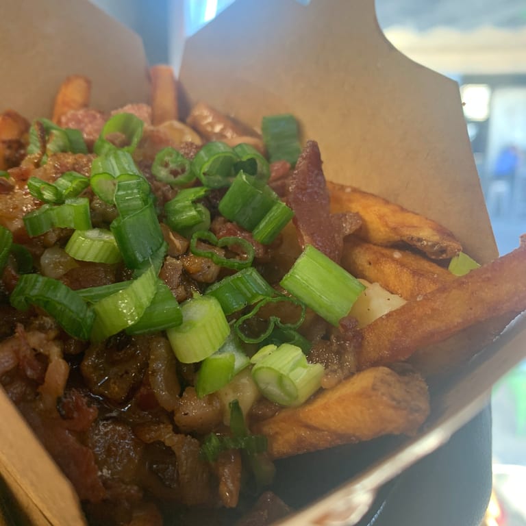 Indulge in Our Poutine